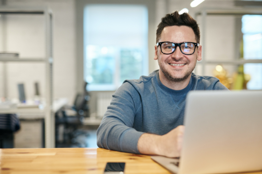 Photo of a man wearing eyeglasses