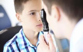 Boy OD eye exam