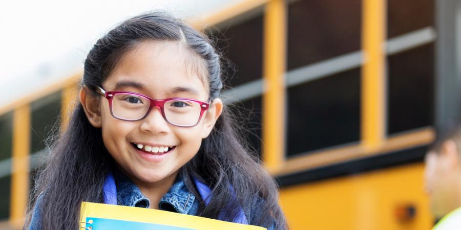 child with glasses